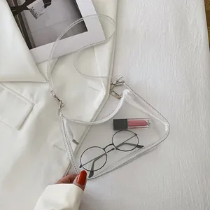 Minimalist clear PVC shoulder bag with silver zipper and adjustable strap for women