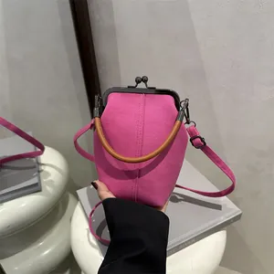 Mini rose pink doctor style canvas crossbody bag with vintage metal clasp and leather handle
