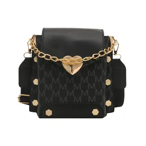Mini bolso bandolera vintage negro para mujer con monograma M y cierre de corazón dorado