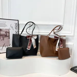 Large leather tote bag set with matching pouch and printed scarf in black and brown