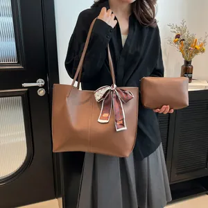 Brown tote bag set with matching small pouch and silk scarf detail for women