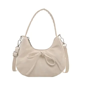 Minimalistische beige Hobo-Tasche mit süßer Schleife und vielseitigen Doppel-Schultergurten