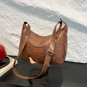 Brown vintage pleated PU leather tote bag with FASHION label and adjustable strap