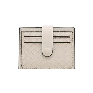 Slim off-white woven leather card holder for women with multi-slot design and snap closure