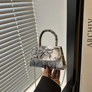 Women Vintage Snake Print Mini Crossbody Bag With Silver Metal Bow PU Leather Handbag Elegant Flap Magnetic Underarm Bag
