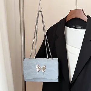 Fashionable light blue pleated chain shoulder bag with silver butterfly metal decoration