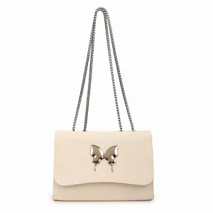 Elegant beige textured leather shoulder bag with silver butterfly and chain strap