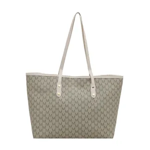 Vintage large taupe tote bag with letter M monogram print and cream white handles