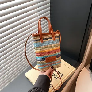 Colorful striped woven crossbody phone bag for women with leather trim and fashion tag