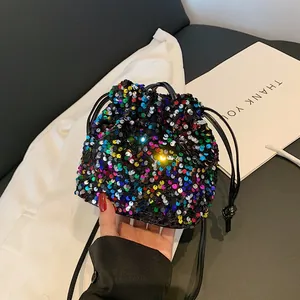 Chic multicolor sequin bucket bag with drawstring closure and slim shoulder strap