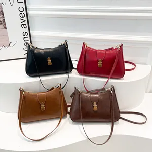 French vintage crescent shoulder bags in four colors with antique bronze hardware