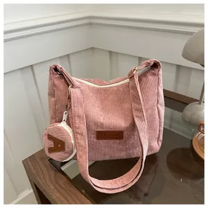 Pink corduroy tote bag with fashion leather patch and a small round coin purse charm