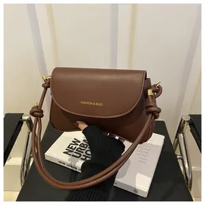 Deep brown leather underarm bag with Fashion & Bags print and stylish knotted strap
