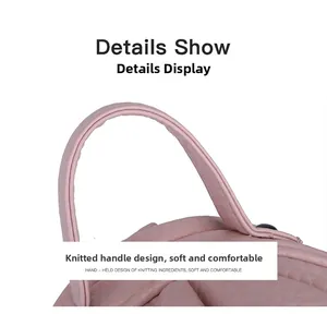 Close-up of the soft knitted handle on a pink lychee pattern mini backpack for women