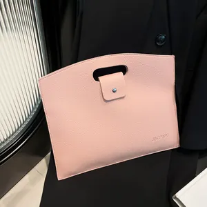 Pink lychee texture laptop handbag for women with minimalist cutout handle and snap button