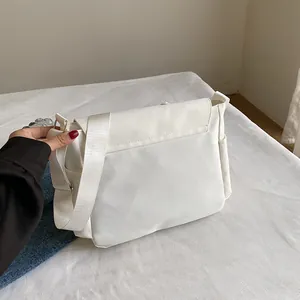 Japanese style white minimalist messenger bag with adjustable wide shoulder strap