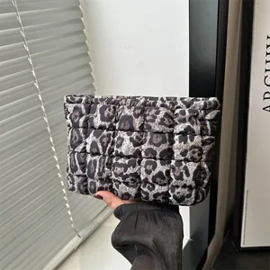Stylish quilted leopard print clutch bag featuring chic pleated design for modern women