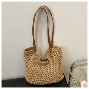 Macro view of woven cotton mesh texture with brown leather strap and silver metal rivet