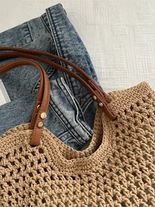Large cotton woven tote bag with brown leather handles and hollow mesh pattern