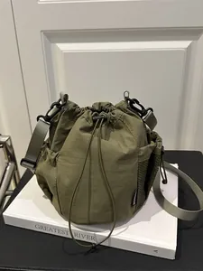 Damen Nylon Kordelzug Eimertasche Outdoor Sportlich Lässige Umhängetasche Mit Verstellbarem Riemen Und Seitlicher Netztasche