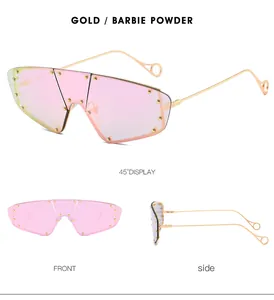 Detailed view of Barbie powder visor sunglasses with gold rivets and metallic frames