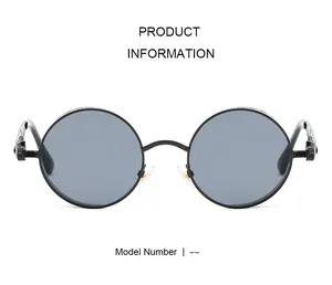 Close-up of steampunk round metal sunglasses with mechanical screw texture on the hinges