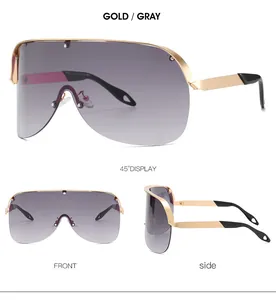 Trois vues de lunettes de soleil demi-cerclées en métal doré avec verres dégradés gris sur blanc
