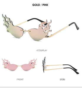 Three-way view of gold metal frameless sunglasses with flame-shaped pink gradient lenses