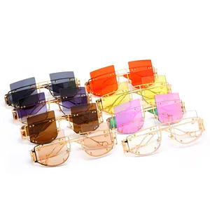 Frameless geometric sunglasses collection in eight vibrant colors with gold metal bridges