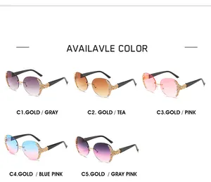 Detail view of five rimless oversized sunglasses with rhinestone temples and gradient lenses