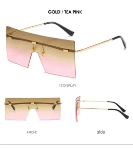 Vues détaillées de lunettes de soleil sans monture dorées avec verres dégradés