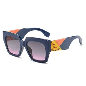 Classic oversized square sunglasses with gradient lenses and tricolor geometric temples