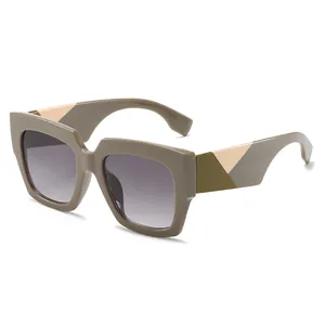 Classic oversized square sunglasses with gray-green frames and geometric color-block temples