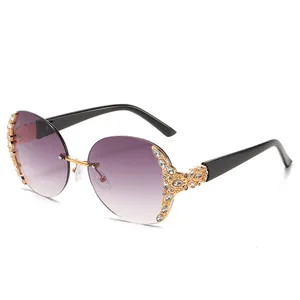 Vintage oversized round rimless sunglasses for women with purple gradient lenses and crystals