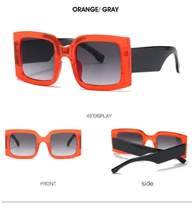 Multiple views of square orange sunglasses with thick black arms and grey gradient lenses
