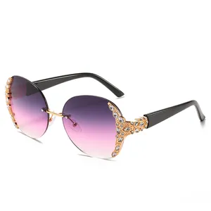 Vintage oversized round rimless sunglasses with purple gradient lenses and sparkling rhinestones