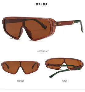 Trois vues des lunettes de soleil masque thé surdimensionnées avec détails de branches verts