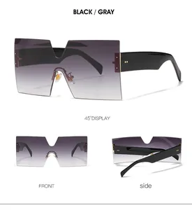 Detail views of oversized square gradient lens sunglasses with black glossy temples