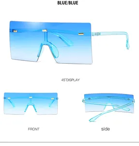 Occhiali da sole oversize senza montatura blu sfumati con accenti dorati e design moderno