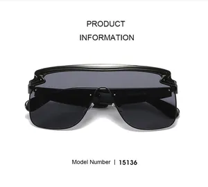 Detail shot of black oversized shield sunglasses featuring inner temple specifications