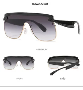Front and side views of oversized shield sunglasses with gradient lenses and gold accents
