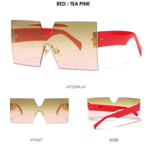 Oversized rimless square sunglasses with red tea pink gradient lenses and gold temples