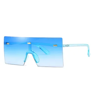 Occhiali da sole oversize quadrati senza montatura con lenti blu e borchie dorate