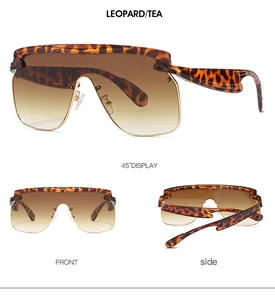 Macro view of leopard print frame and brown gradient lens on stylish square sunglasses
