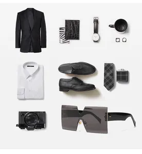 Flat lay of oversized black square sunglasses with classic business attire and accessories