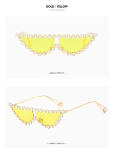 Detailed view of cat eye sunglasses with gold frame, yellow lenses and sparkling rhinestones