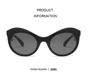 Détails lunettes de soleil œil-de-chat ovales modèle 2080 avec monture noire élégante