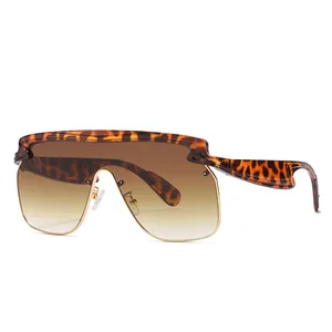 Oversized square sunglasses with leopard print frame and brown gradient lenses