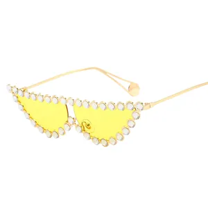 Chic cat eye sunglasses with yellow lenses and sparkling crystal embellished gold frames