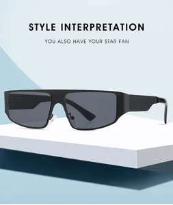 Detail of black futuristic shield sunglasses with dark lenses on a geometric podium